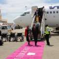 Pics: Pink Carpet & Gombeys Greet Westjet Flight