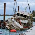 Photos: Boat That Sank In Hurricane Raised