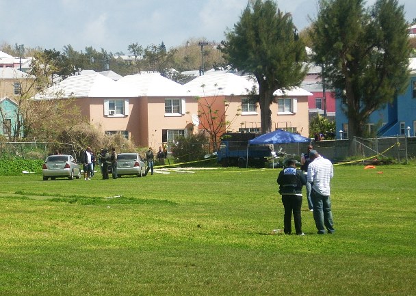 The police examining the scene immediately following the murder