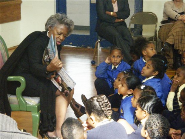 Photo 2 - Dame Jennifer reads to students