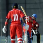 Bermuda's Delyone Borden fires one down the wicket