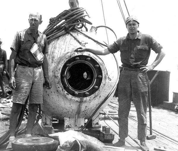William Beebe and Otis Barton with bathysphere after dive off Bermuda in 1934.