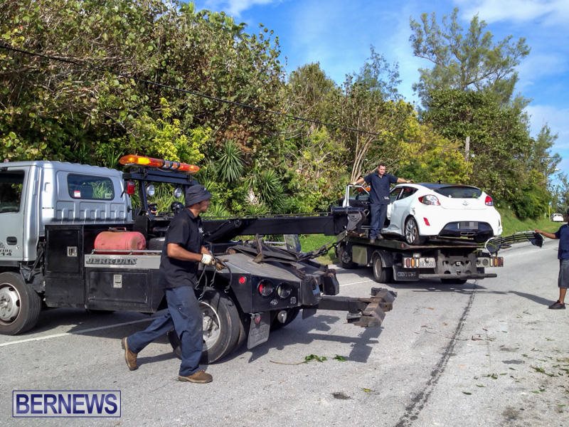 Photos & Video: Car Crashes Over Embankment - Bernews