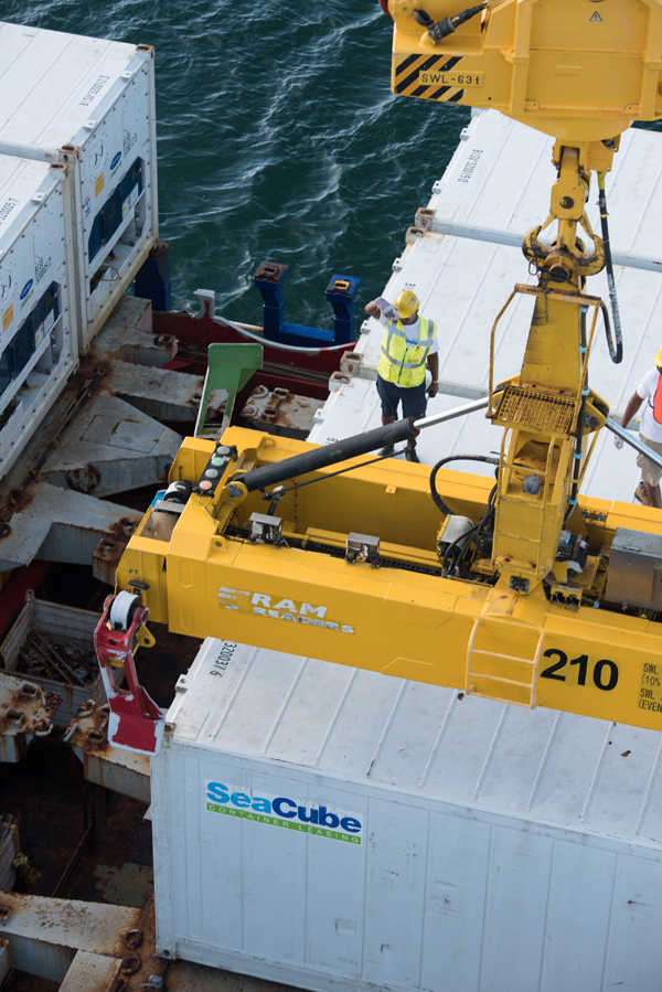 Stevedores in action discharging refrigerated cargo Bermuda March 5 2018