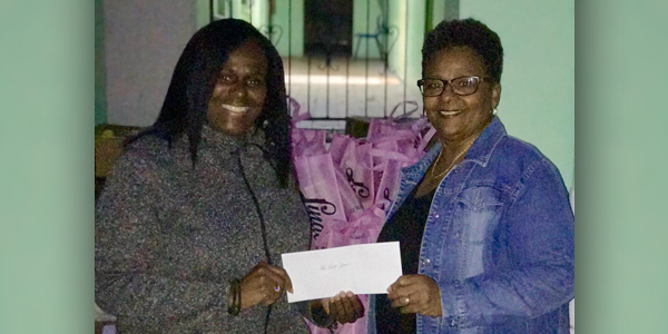 Pastor Veronica Outerbridge Donates $1000 - Bernews