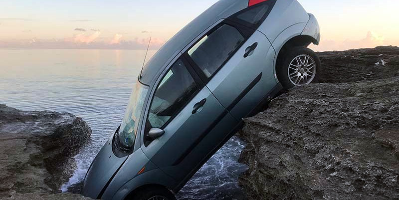 Car Rocking Recorded Photos & Video: Car Crashed On Rocks - Bernews