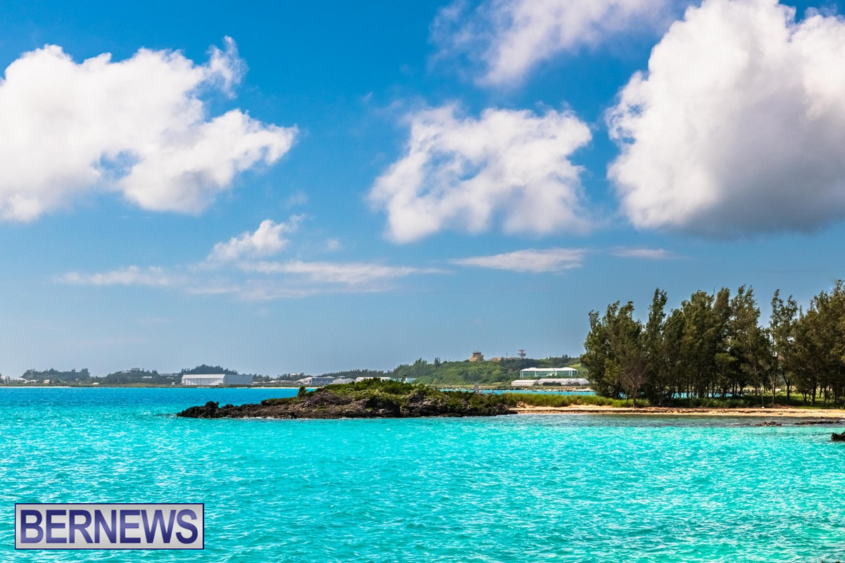 6 Turquoise waters sparkle under a cloudy sky